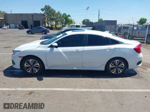 2016 Honda Civic EX-L z VIN 2HGFC1F83GH636374, wystawiony jako IAAI lot #42328432 z przebiegiem 130 738 mil mil oraz . Historia ofert i sprzedaży dostępna na DreamBid. Obrazek 14.