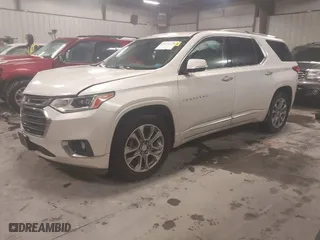 2018 Chevrolet Traverse Premier with VIN 1GNEVJKW2JJ103924, listed as a IAAI auction lot 41576128 with 128,694 mi miles. Bid and sale history available at carsss.com. Image 2.
