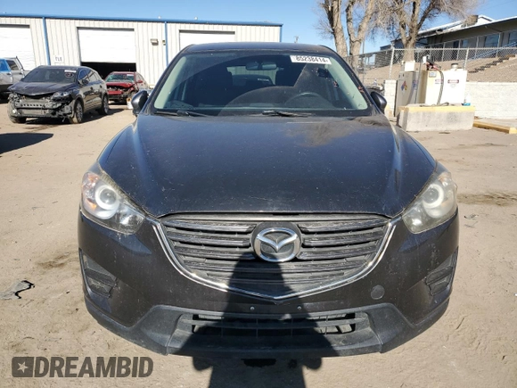 2016 Mazda CX-5 Sport with VIN JM3KE4BY3G0907976, listed as a Copart auction lot 85238414 with 92,933 mi miles and Salvage title. Bid and sale history available at DreamBid. Image 5.