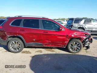 2020 Jeep Cherokee Latitude Plus with VIN 1C4PJLLB3LD624382, listed as a IAAI auction lot 40799441 with 66,588 mi miles. Bid and sale history available at carsss.com. Image 12.