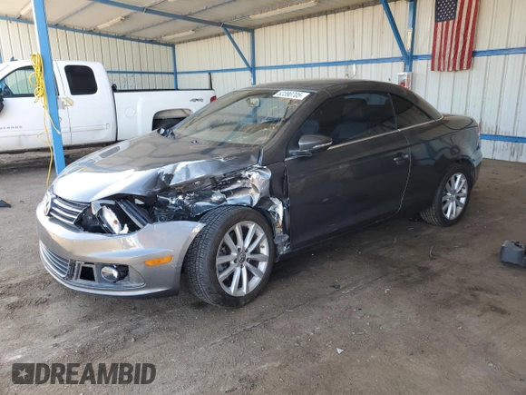 2014 Volkswagen Eos Komfort with VIN WVWBW8AH9EV006190, listed as a Copart auction lot 52390705 with 124,370 mi miles and Salvage Title. Bid and sale history available at DreamBid. Image 1.