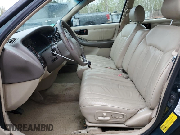 1998 Toyota Avalon XL with VIN 4T1BF18B6WU242906, listed as a Copart auction lot 52385935 with 108,802 mi miles and Salvage Title. Bid and sale history available at DreamBid. Image 7.