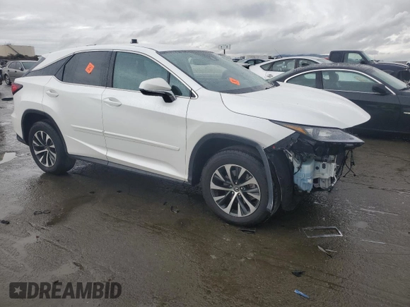 2022 Lexus RX 350 with VIN 2T2AZMDA5NC336823, listed as a Copart auction lot 86950954 with 38,959 mi miles and Salvage title. Bid and sale history available at DreamBid. Image 4.