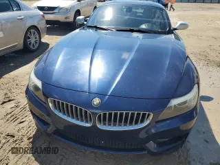 2011 BMW Z4 sDrive35is with VIN WBALM1C56BE393858, listed as a Copart auction lot 74249954 with 0 mi miles and Salvage Title. Bid and sale history available at carsss.com. Image 5.