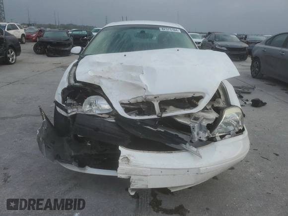 2003 Mercury Sable z VIN 1MEHM50U03G607064, wystawiony jako Copart lot #82373104 z przebiegiem 103 150 mil mil oraz Szkoda całkowita • Salvage title. Historia ofert i sprzedaży dostępna na DreamBid. Obrazek 5.