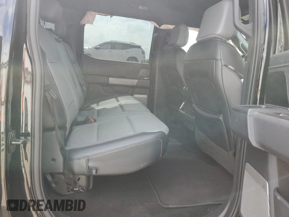 2022 Ford F-150 Lightning Pro with VIN 1FTVW1EL7NWG05344, listed as a Copart auction lot 53165455 with 29,756 mi miles and Salvage title. Bid and sale history available at DreamBid. Image 10.