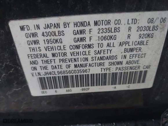 2006 Acura TSX with VIN JH4CL96856C035967, listed as a IAAI auction lot 41973058 with 301,387 mi miles. Bid and sale history available at carsss.com. Image 9.