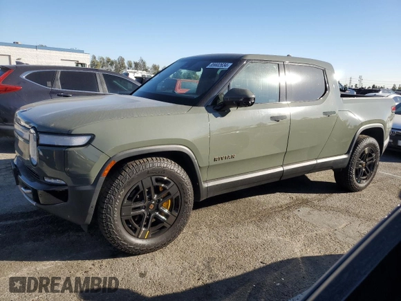 2022 Rivian R1T Launch Edition z VIN 7FCTGAAL3NN003101, wystawiony jako Copart lot #85602634 z przebiegiem 17 189 mil mil oraz Szkoda całkowita • Salvage title. Historia ofert i sprzedaży dostępna na DreamBid. Obrazek 1.