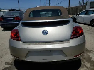 2014 Volkswagen Beetle 1.8T with VIN 3VW517AT9EM820812, listed as a Copart auction lot 61730685 with 85,571 mi miles and Clean title. Bid and sale history available at DreamBid. Image 6.