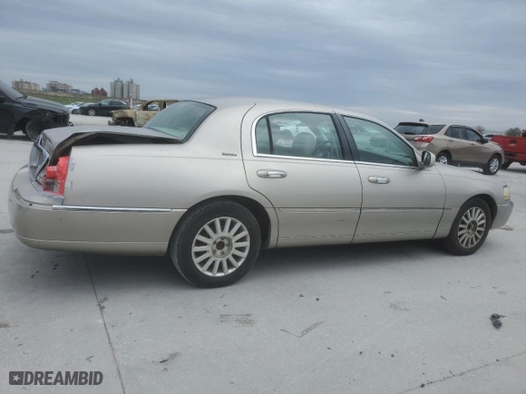 2003 Lincoln Town Car Signature with VIN 1LNHM82W83Y616313, listed as a Copart auction lot 44322305 with 0 mi miles and Salvage Title. Bid and sale history available at carsss.com. Image 3.