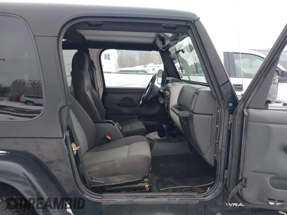 2005 Jeep Wrangler X with VIN 1J4FA39S55P353131, listed as a IAAI auction lot 41575949 with 154,026 mi miles and . Bid and sale history available at DreamBid. Image 5.