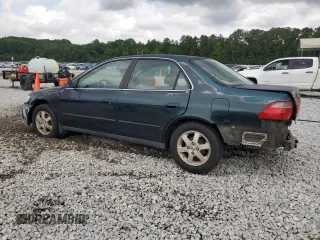 2000 Honda Accord SE with VIN 1HGCG5677YA049486, listed as a Copart auction lot 58548565 with 267,067 mi miles and Salvage title. Bid and sale history available at DreamBid. Image 2.