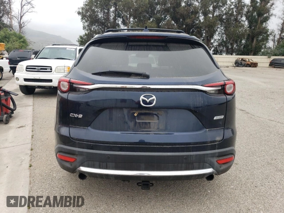 2017 Mazda CX-9 Grand Touring z VIN JM3TCADY3H0140573, wystawiony jako Copart lot #60513145 z przebiegiem 97 793 mil mil oraz Czysty tytuł • Clean title. Historia ofert i sprzedaży dostępna na DreamBid. Obrazek 6.