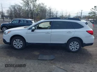 2016 Subaru Outback 2.5i Premium with VIN 4S4BSADC5G3221529, listed as a IAAI auction lot 42037509 with 57,874 mi miles. Bid and sale history available at carsss.com. Image 14.