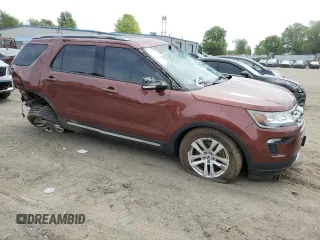 2018 Ford Explorer XLT with VIN 1FM5K8D81JGA11477, listed as a Copart auction lot 58386475 with 93,818 mi miles and Salvage title. Bid and sale history available at DreamBid. Image 4.