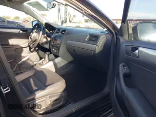 2015 Volkswagen Jetta Sedan 1.8T SE with VIN 3VWD17AJ9FM341950, listed as a IAAI auction lot 41778772 with 121,954 mi miles. Bid and sale history available at carsss.com. Image 5.