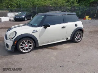 2008 MINI Cooper Hardtop S with VIN WMWMF73578TV33406, listed as a IAAI auction lot 42081596 with 120,183 mi miles. Bid and sale history available at carsss.com. Image 2.