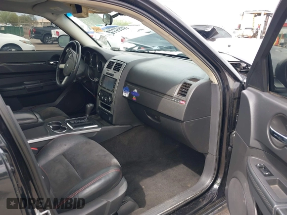 2009 Dodge Charger SRT-8 with VIN 2B3KA73W89H587394, listed as a IAAI auction lot 41795511 with 85,398 mi miles and . Bid and sale history available at carsss.com. Image 5.