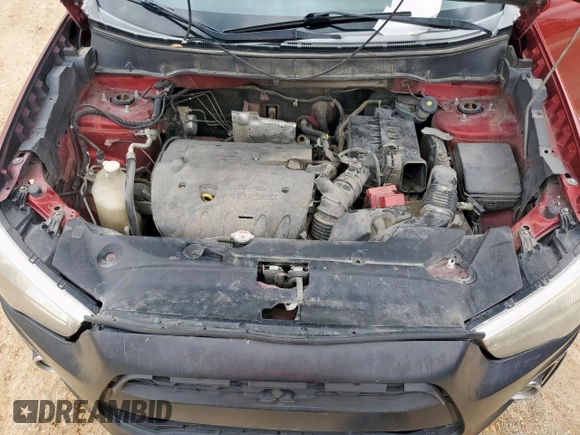 2014 Mitsubishi Outlander SE z VIN 4A4AP4AU7EE010827, wystawiony jako Copart lot #59308555 z przebiegiem 165 321 mil mil oraz Szkoda całkowita • Salvage title. Historia ofert i sprzedaży dostępna na DreamBid. Obrazek 11.