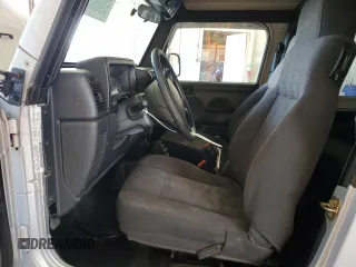 2003 Jeep Wrangler X with VIN 1J4FA39S43P350248, listed as a Copart auction lot 52089395 with 162,524 mi miles and Salvage Title. Bid and sale history available at carsss.com. Image 7.