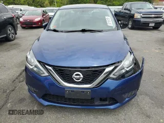 2019 Nissan Sentra S z VIN 3N1AB7AP7KY406923, wystawiony jako Copart lot #55166185 z przebiegiem 58 858 mil mil oraz Szkoda całkowita • Salvage title. Historia ofert i sprzedaży dostępna na DreamBid. Obrazek 5.