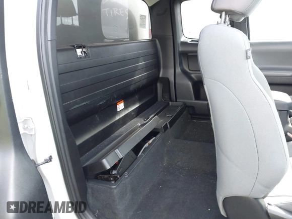 2021 Toyota Tacoma SR with VIN 3TYRX5GN6MT007673, listed as a IAAI auction lot 41691995 with 97,735 mi miles and . Bid and sale history available at DreamBid. Image 8.