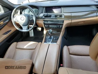 2015 BMW 7 Series 750i xDrive with VIN WBAYB6C53FD966042, listed as a Copart auction lot 69387464 with 64,977 mi miles and Salvage Title. Bid and sale history available at carsss.com. Image 8.