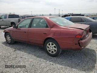 1999 Toyota Camry LE z VIN JT2BF22K8X0181675, wystawiony jako Copart lot #55057875 z przebiegiem 184 657 mil mil oraz Szkoda całkowita • Salvage title. Historia ofert i sprzedaży dostępna na DreamBid. Obrazek 2.