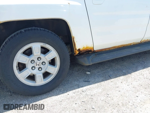 2008 Honda Ridgeline RTS z VIN 2HJYK16488H529857, wystawiony jako IAAI lot #42212085 z przebiegiem 183 097 mil mil oraz . Historia ofert i sprzedaży dostępna na DreamBid. Obrazek 17.
