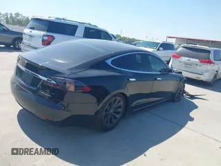 2020 Tesla Model S Long Range with VIN 5YJSA1E27LF397346, listed as a IAAI auction lot 40579015 with 43,779 mi miles and . Bid and sale history available at DreamBid. Image 4.