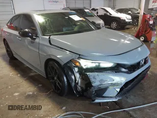 2022 Honda Civic Si with VIN 2HGFE1E59NH472028, listed as a IAAI auction lot 41249075 with 37,970 mi miles and . Bid and sale history available at DreamBid. Image 1.