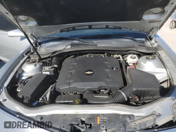 2013 Chevrolet Camaro LT z VIN 2G1FB1E31D9113862, wystawiony jako Copart lot #70308254 z przebiegiem Nie podano mil oraz Szkoda całkowita • Salvage title. Historia ofert i sprzedaży dostępna na DreamBid. Obrazek 12.