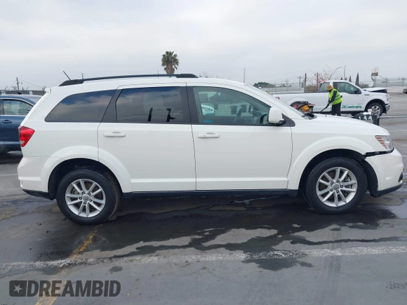 2015 Dodge Journey SXT with VIN 3C4PDDBG9FT600712, listed as a IAAI auction lot 42090741 with 111,741 mi miles and . Bid and sale history available at DreamBid. Image 13.