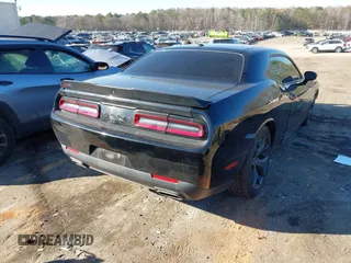2020 Dodge Challenger SXT with VIN 2C3CDZAG1LH240339, listed as a IAAI auction lot 41613082 with 69,450 mi miles and . Bid and sale history available at DreamBid. Image 4.