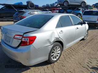2012 Toyota Camry L with VIN 4T4BF1FKXCR216121, listed as a IAAI auction lot 41942104 with 153,448 mi miles. Bid and sale history available at carsss.com. Image 4.
