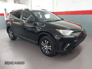 2017 Toyota RAV4 LE with VIN 2T3BFREV6HW598229, listed as a IAAI auction lot 41987566 with 82,871 mi miles. Bid and sale history available at carsss.com. Image 1.
