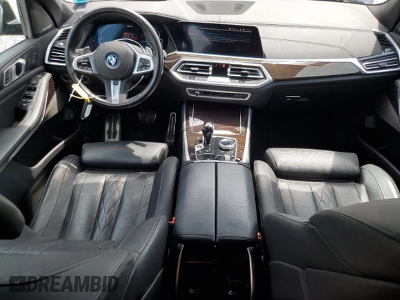 2023 BMW X5 xDrive45e z VIN 5UXTA6C01P9R61137, wystawiony jako Copart lot #56458155 z przebiegiem 27 501 mil mil oraz Szkoda całkowita • Salvage title. Historia ofert i sprzedaży dostępna na DreamBid. Obrazek 8.