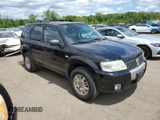2005 Mercury Mariner Luxury z VIN 4M2CU57185DJ16120, wystawiony jako Copart lot #61803024 z przebiegiem 176 498 mil mil oraz Szkody całkowita. Historia ofert i sprzedaży dostępna na DreamBid. Obrazek 4.