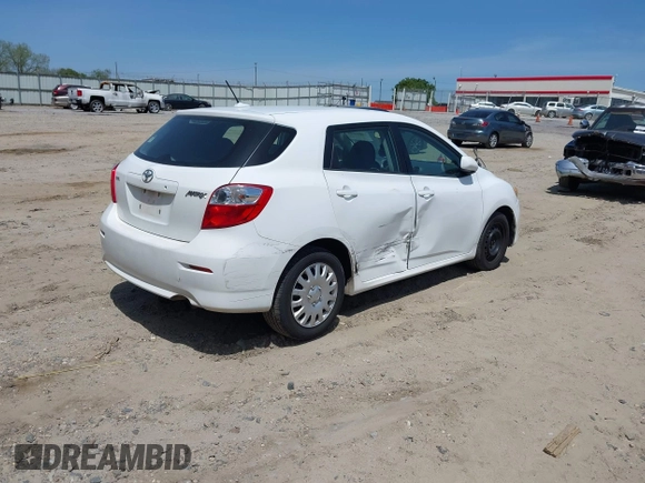 2009 Toyota Matrix with VIN 2T1KU40E39C091087, listed as a IAAI auction lot 42033558 with 338,496 mi miles. Bid and sale history available at carsss.com. Image 4.