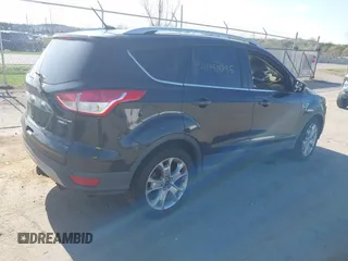 2015 Ford Escape Titanium with VIN 1FMCU9J94FUC33962, listed as a IAAI auction lot 41990795 with Not provided miles and . Bid and sale history available at DreamBid. Image 4.