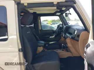 2018 Jeep Wrangler Sahara z VIN 1C4AJWBGXJL811092, wystawiony jako IAAI lot #42305620 z przebiegiem 41 021 mil mil oraz . Historia ofert i sprzedaży dostępna na DreamBid. Obrazek 5.