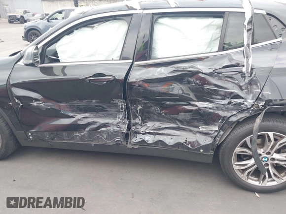 2019 BMW X2 sDrive28i with VIN WBXYJ3C58KEP77334, listed as a IAAI auction lot 42575165 with 98,910 mi miles and . Bid and sale history available at DreamBid. Image 6.