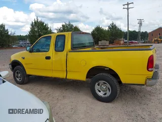 2000 Ford F-150 XL with VIN 1FTRX18W0YKB28000, listed as a IAAI auction lot 42451649 with 193,718 mi miles and . Bid and sale history available at DreamBid. Image 14.