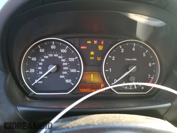 2009 BMW 1 Series 128i with VIN WBAUN13569VH80991, listed as a Copart auction lot 43225685 with 104,652 mi miles and Salvage Title. Bid and sale history available at DreamBid. Image 9.