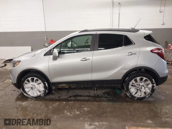 2021 Buick Encore Preferred with VIN KL4CJESB5MB308467, listed as a IAAI auction lot 41569987 with 52,199 mi miles. Bid and sale history available at carsss.com. Image 14.