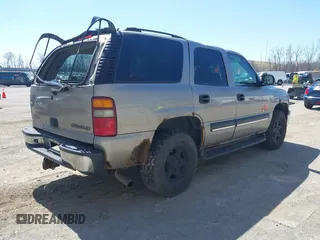 2003 Chevrolet Tahoe LT with VIN 1GNEK13Z83J107450, listed as a IAAI auction lot 42006801 with 310,767 mi miles and . Bid and sale history available at DreamBid. Image 4.