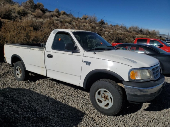 1999 Ford F-150 z VIN 1FTRF18W1XKA87801, wystawiony jako Copart lot #79094454 z przebiegiem Nie podano mil oraz Szkoda całkowita • Salvage title. Historia ofert i sprzedaży dostępna na DreamBid. Obrazek 4.