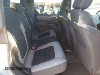 2023 Ford Bronco z VIN 1FMEE5DP0PLB15763, wystawiony jako Copart lot #45592725 z przebiegiem 26 672 mil mil oraz Szkoda całkowita • Salvage title. Historia ofert i sprzedaży dostępna na DreamBid. Obrazek 10.