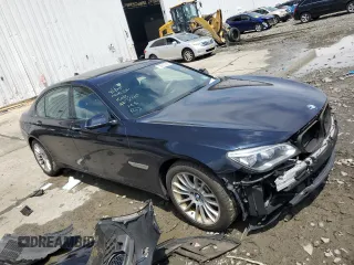 2014 BMW 7 Series ALPINA B7 xDrive with VIN WBAYF8C5XED653245, listed as a Copart auction lot 56010085 with 114,519 mi miles and Salvage title. Bid and sale history available at DreamBid. Image 4.
