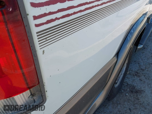 1999 Ford Econoline Cargo Recreational with VIN 1FDRE14L2XHA41059, listed as a IAAI auction lot 42067879 with 149,185 mi miles. Bid and sale history available at carsss.com. Image 21.